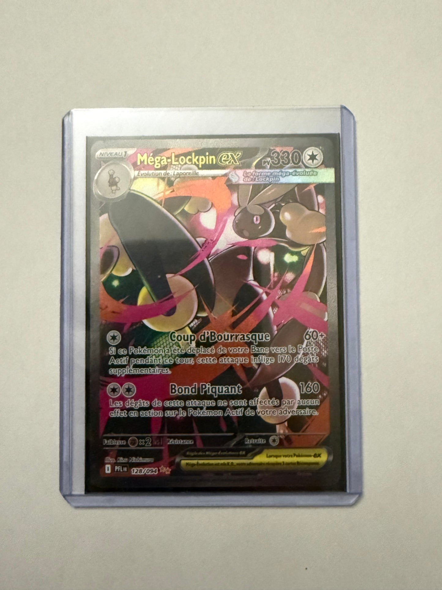 Carte Pokémon ALT Mega Lockpin Ex (Me2 128) Mint Française + 1 carte mystère