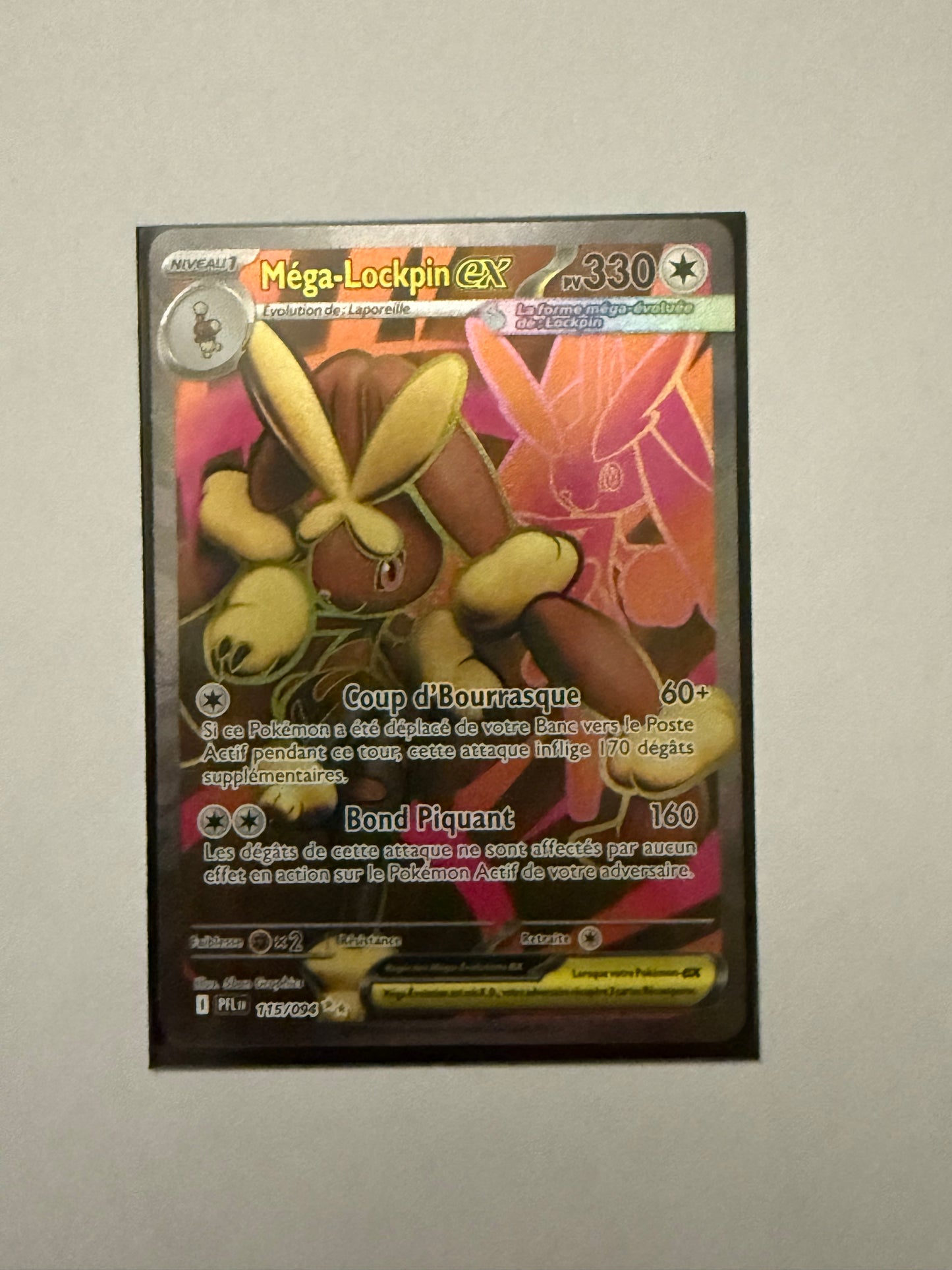 Carte Pokémon FA Mega Lockpin (Me2 115) Mint Française + 1 carte mystère